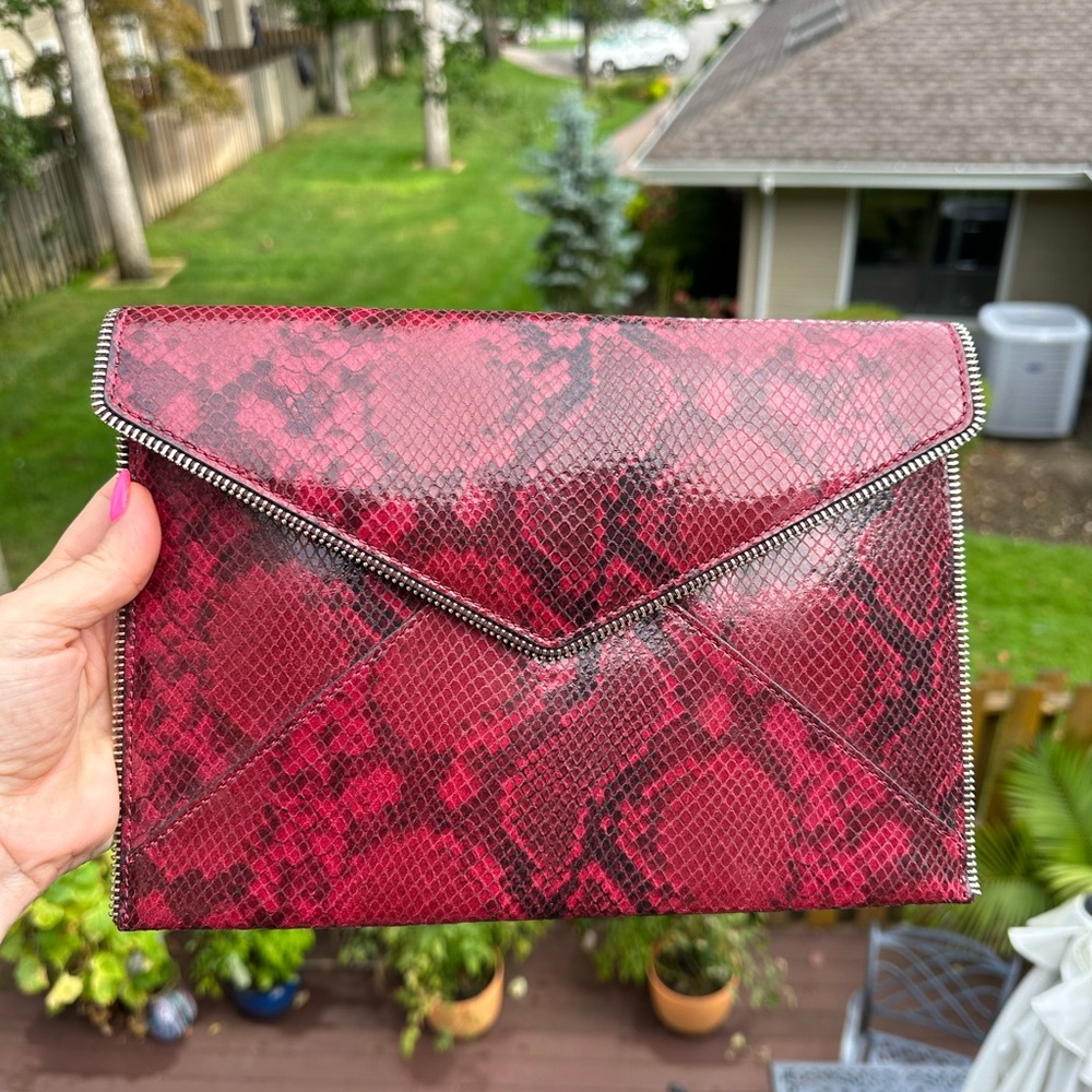 Rebecca Minkoff Leo Clutch red snake print leather with edgy zipper trim